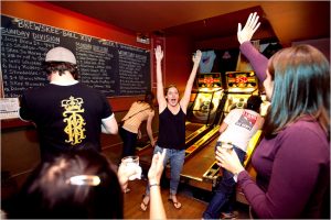 BROOKLYN -- APRIL 07, 2010: Melissa Brusca, of The Big Lebrewskees, celebrates while playing skee ball at Full Circle Bar on April 07, 2010 in Williamsburg, Brooklyn. (PHOTOGRAPH BY MICHAEL NAGLE) NYTCREDIT: Michael Nagle for The New York Times